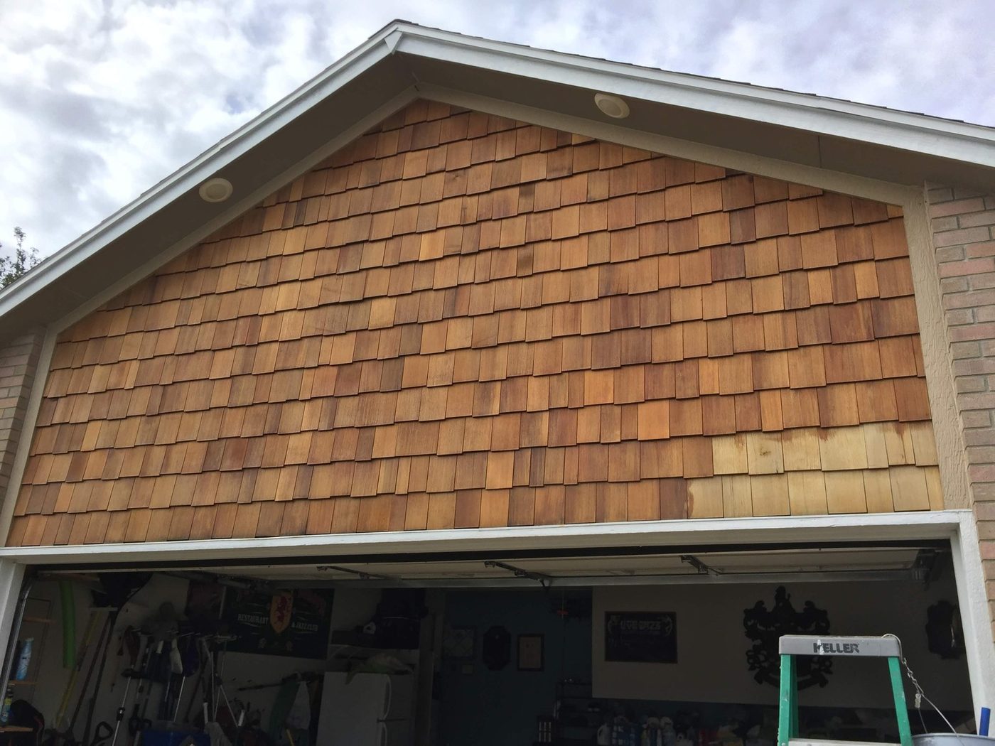 Cedar shingle gable and garage trim finished on a Sioux Falls area home